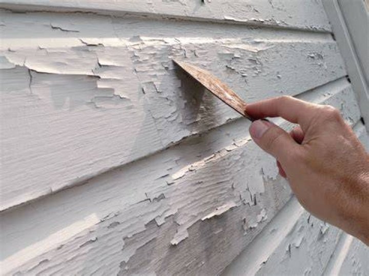 Can I paint over peeling paint on wood?