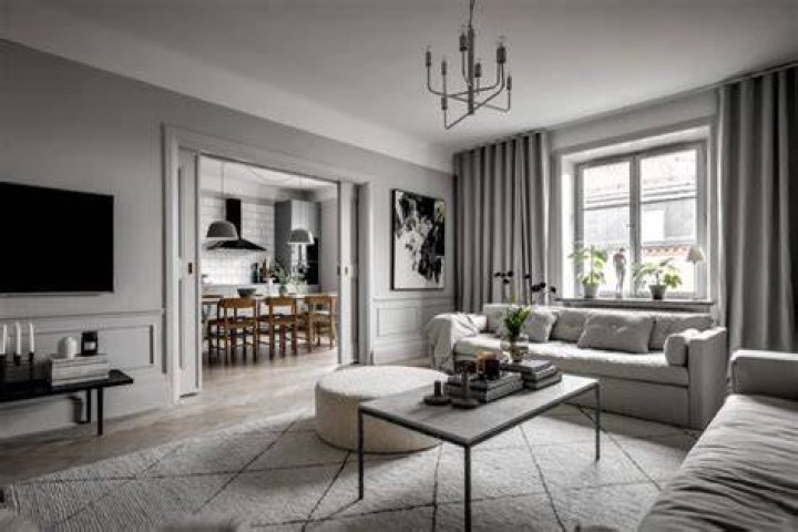 Do white walls make a room brighter?