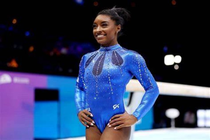 Does Simone Biles get paid for being a gymnast?