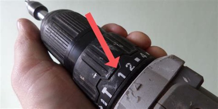 How do you adjust the torque on a drill?
