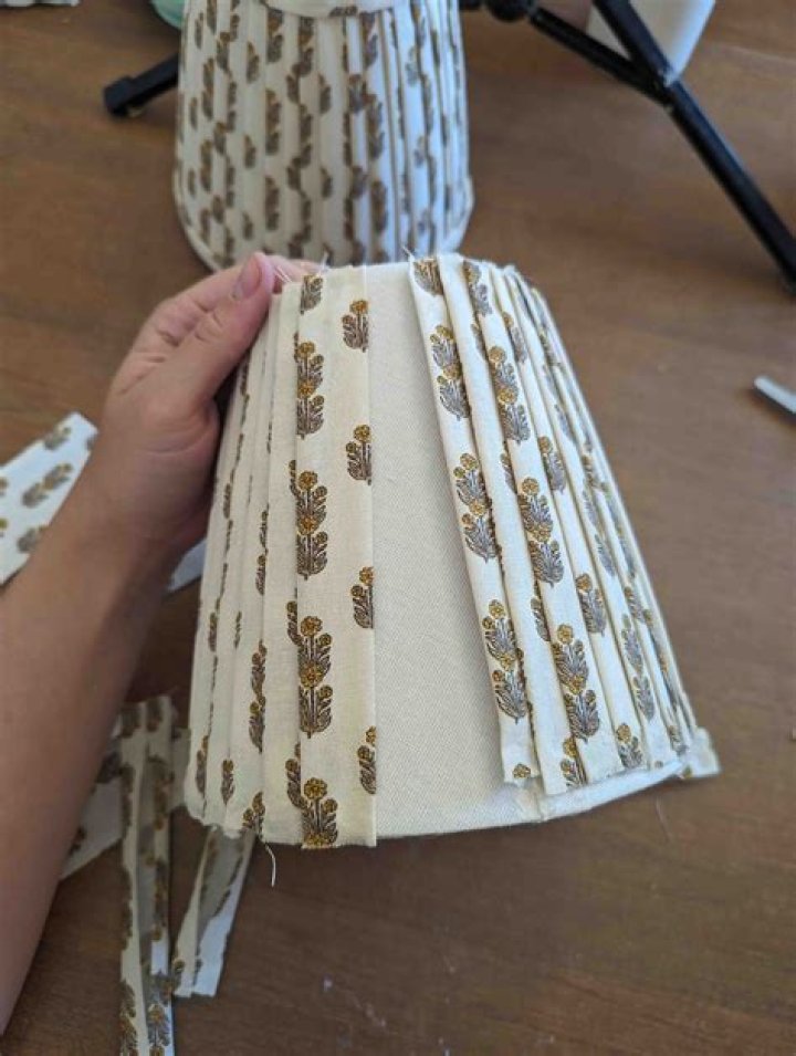 How do you cover a lampshade in fabric?