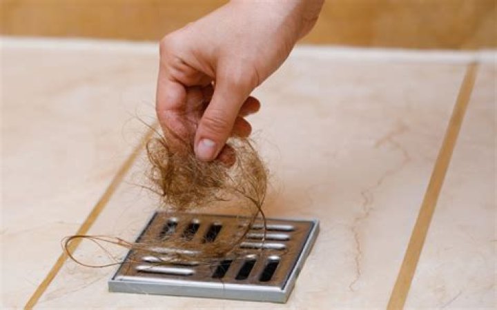 How do you get hair out of a linear drain?