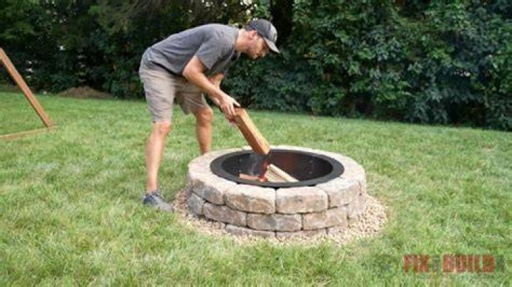 How do you make a fire pit give off more heat?