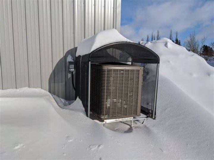 Should you cover your heat pump in the winter?