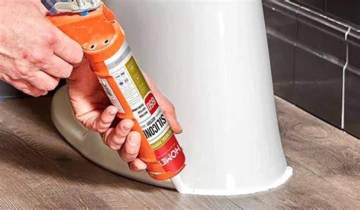 What does silicone caulk not stick to?