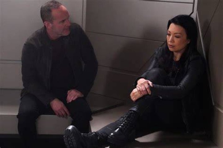 What episode does May and Coulson kiss?