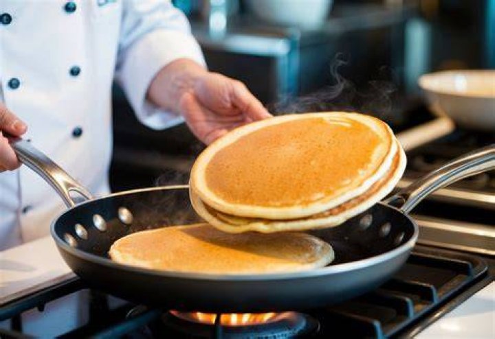Why do chefs flip food in a pan?