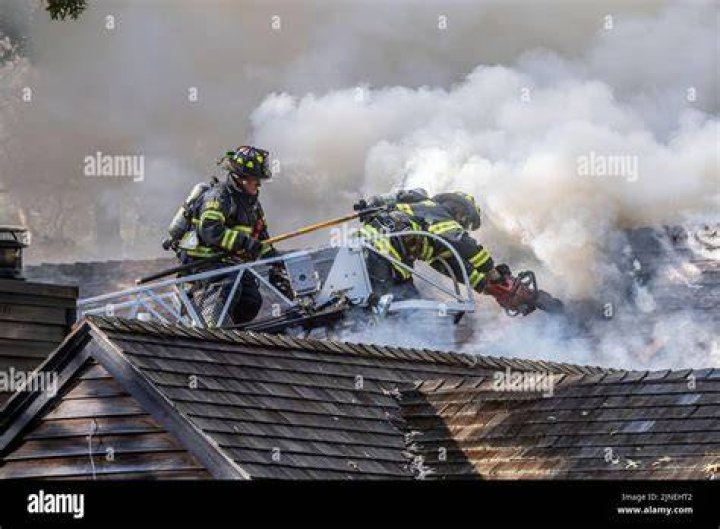 Why do firefighters cut holes in roofs?